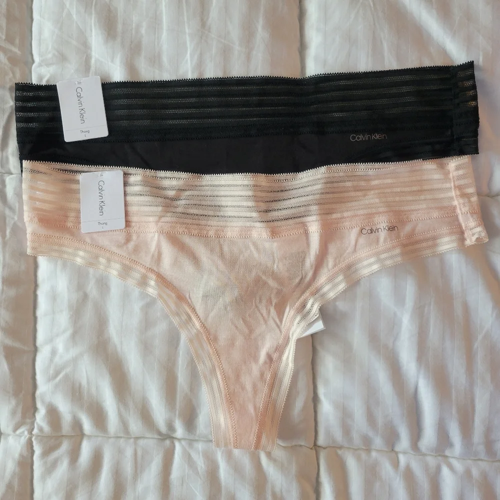 CALVIN KLEIN BRAND NEW SET OF TWO THONGS SIZE L - Picture 1 of 11